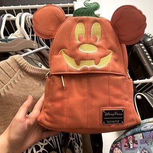 Mickey Pumpkin Loungefly. Slightly warn.